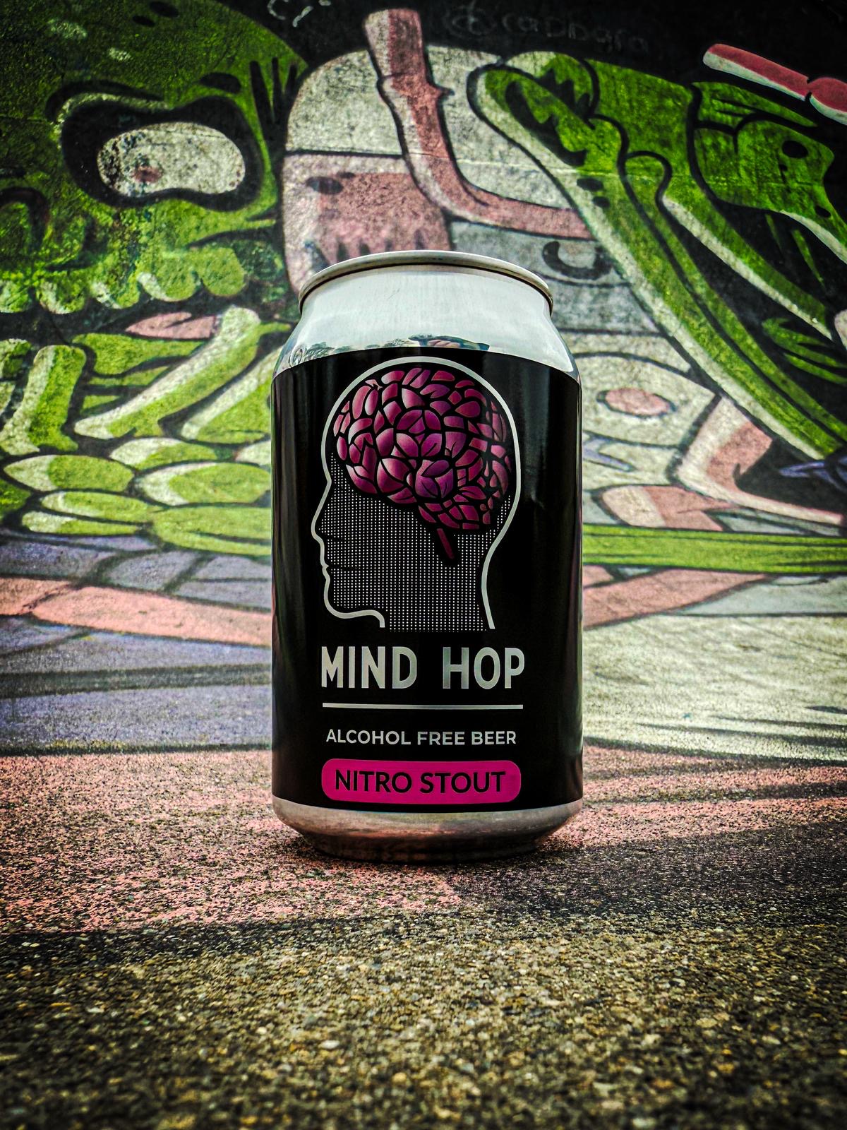 Mind Hop Nitro Stout Alcohol Free Beer with a graffitied skate park as a background